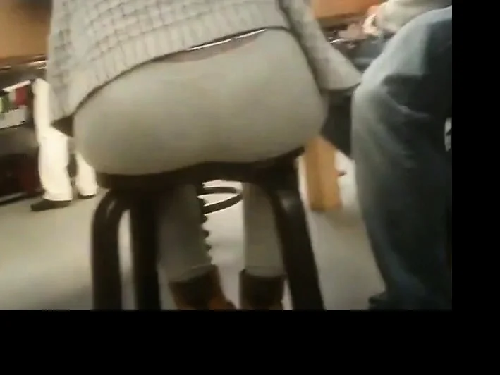 women sitting down in a store