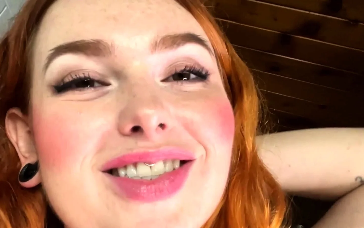 Redheaded amateur MILF with a sex toy on webcam show