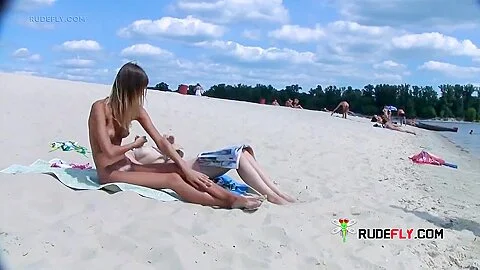 Young Nudist With Big Boobs Loves Spending Time At The Beach