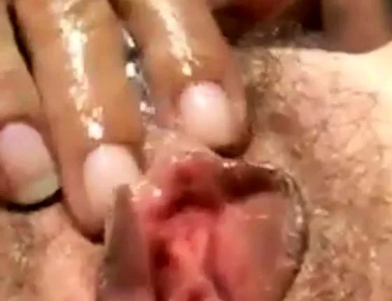 Hairy sloppy pussy cougar fingering herself