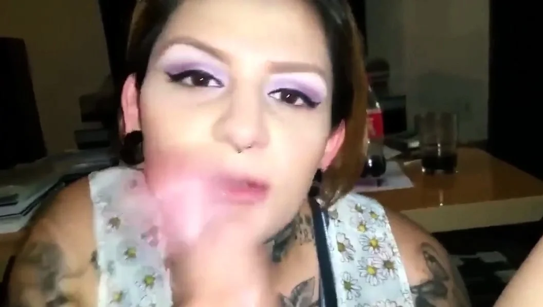 tattooed girl sucks cock