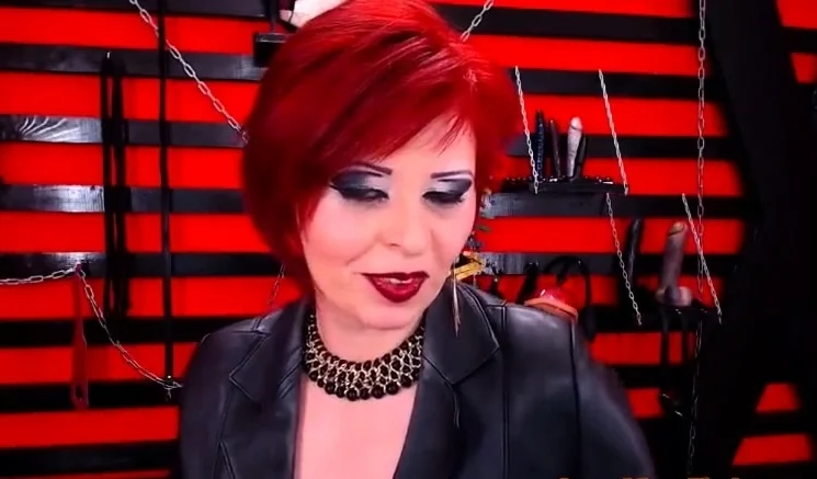 Seductive Red Head Dom Milf Smoking On Cam In Boots