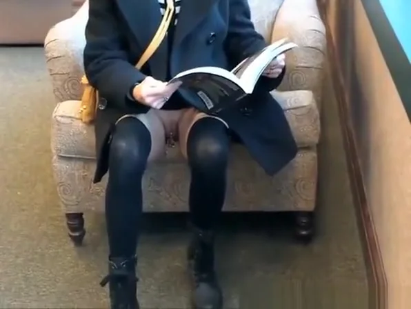 Exhibitionist woman at book store