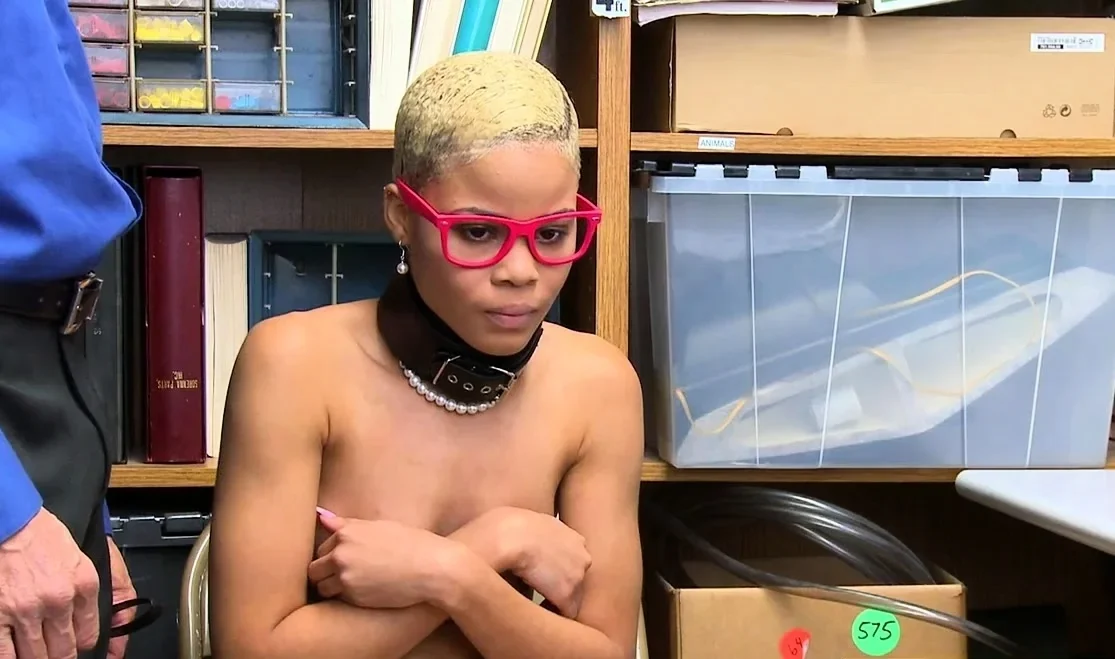 A teen ebony babe stripped then fucked by security officer