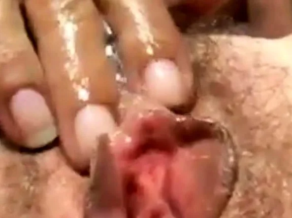 Hairy sloppy pussy cougar fingering herself