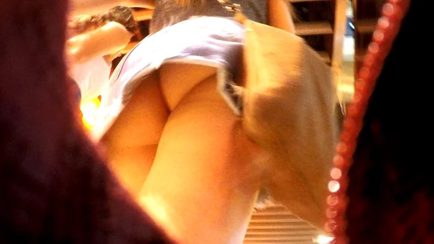 Upskirt inside a jeans miniskirt while walking