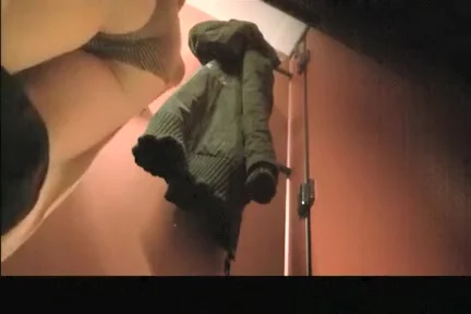 Woman spied drying and dressing