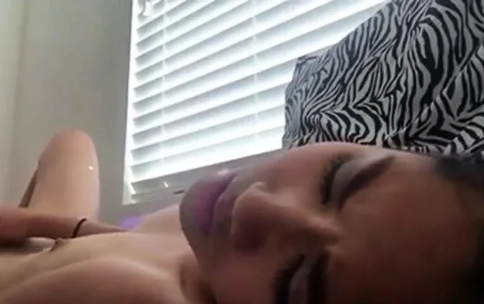 Amateur Asian teen records her masturbation