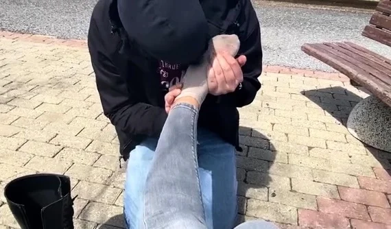 Brunette with foot fetish rubs big dick with her feet in POV