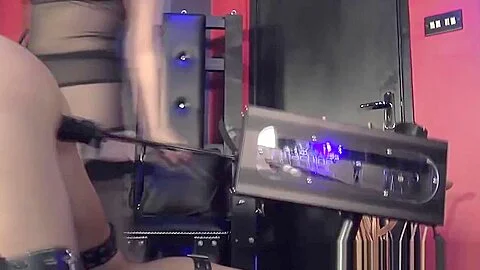 Mistress dominating subject with machine