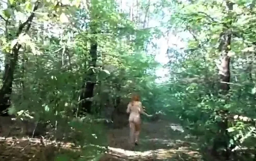chubby girl with big booty walking nude in forest
