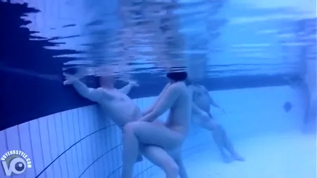 Nudists in the pool get filmed underwater