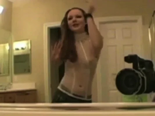 Dance! Red head dances in her bathroom.