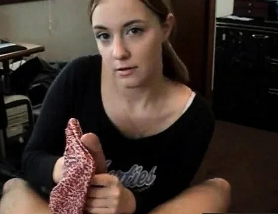 Playing with a hard cock using mouth and satin panties