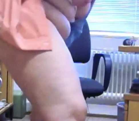 Office girl teases in her office