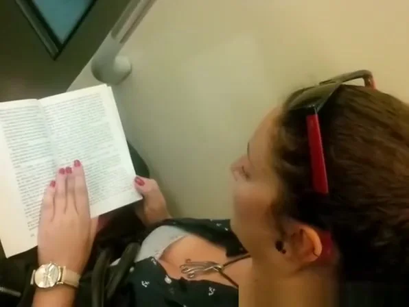 Down blouse in chick reading a book