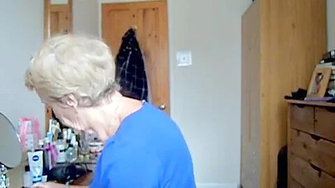 Wearing a blue skirt and flashing her tits