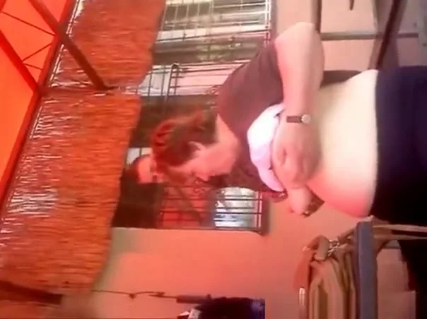 Mature woman showing boobs