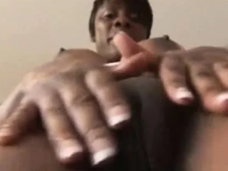 EBONY MILF SHOWS OFF HER CAMEL TOE AND PHAT BLACK PUSSY