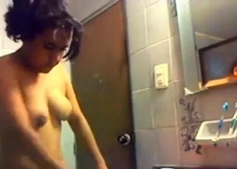 Tanned girl grindingnher pussy on the sink