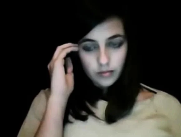 Webcam Teen eyes green.