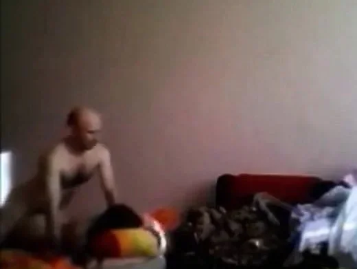 Bald man having fun with a girl