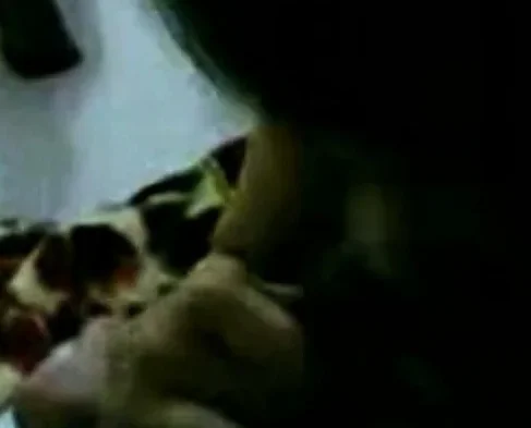 Malaysian girl in a close-up amateur video.