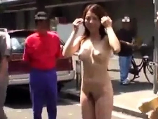Japanese girl strips naked in crowded area