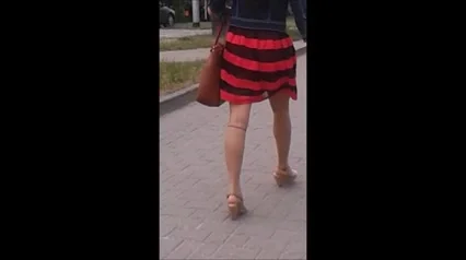 Girl with sexy legs in nylon socks and wedges