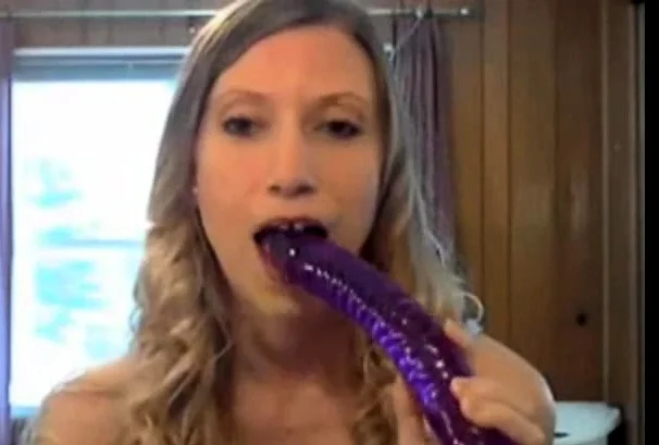 She takes a huge dildo in her ass