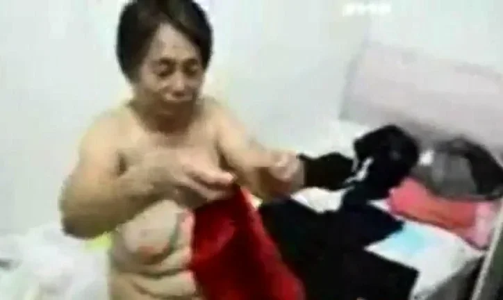 Asian Grandma get dressed after sex