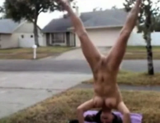 hot babe gets caught doing naked yoga in front of her house