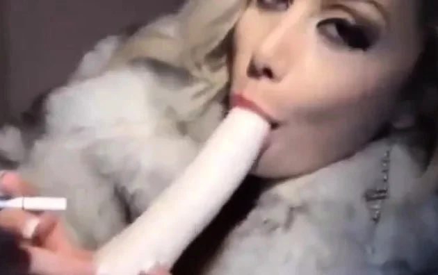Trisha Annabelle smoking on webcam fur coat