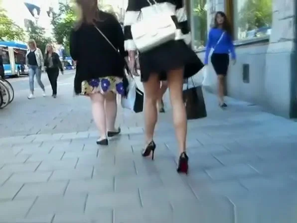 Sexy long legs woman upskirt