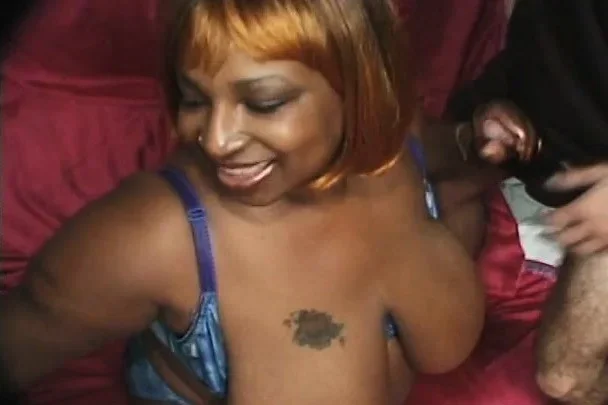 Super fat black babe is giving gorgeous blowjob to white dude