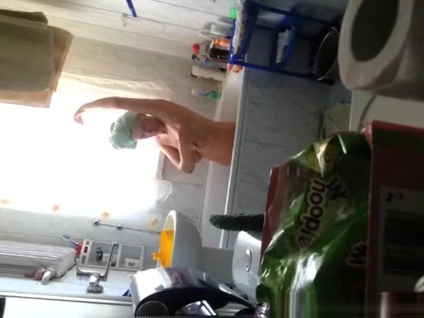 Woman spied in bathtub washing