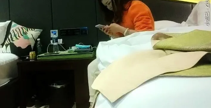 Cute amateur asian web cam girl playing with her toy