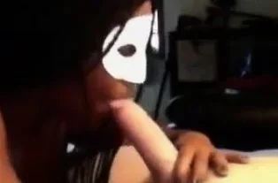 Compilation of a masked black chick sucking white cock