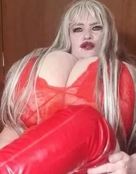 Susi wearing red fishnet red boots teasing lick my boots