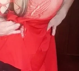 Red devil lady with strapon is giving instructions