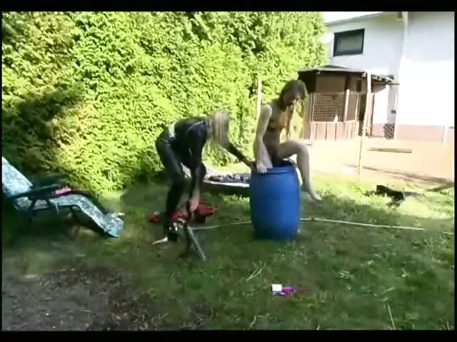 Sexy domina torturing a hot girl