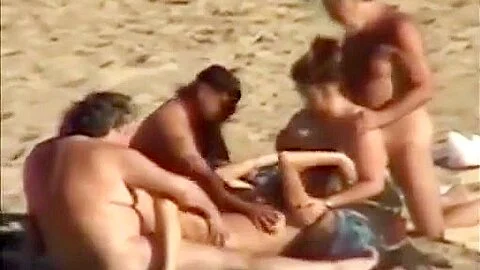Group sex at a nudist beach