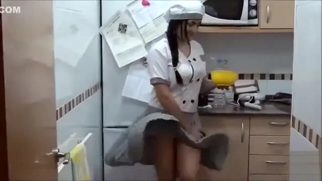 Cooking woman and her heavenly bottom