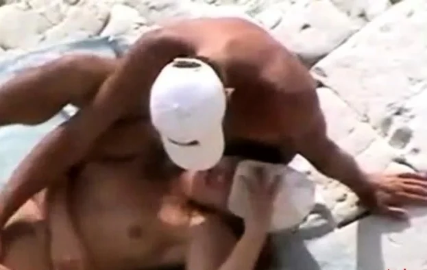 Nice couple fingering on the beach