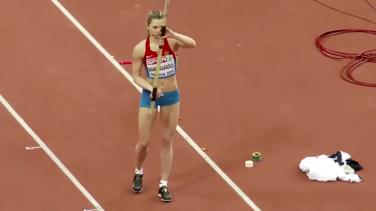 Pole vaulter with a nice butt competes in an event