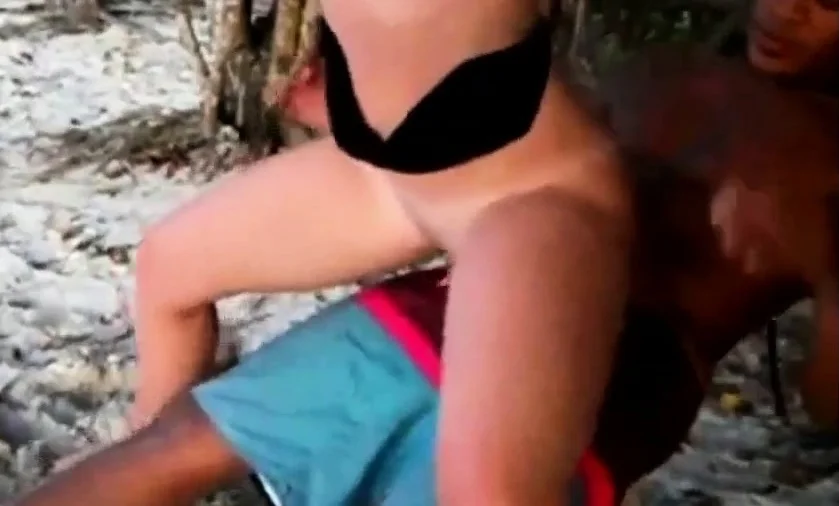White girl fucks black guy on beach