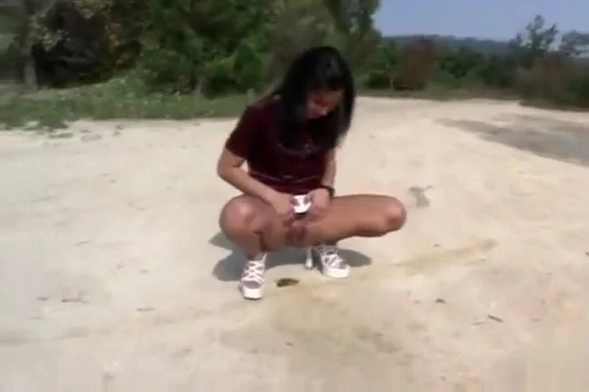 Naughty girlfriends compete to see who can piss the farthest distance