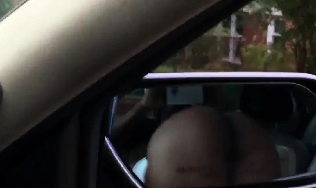 Black slut sucking dick in front seat of car
