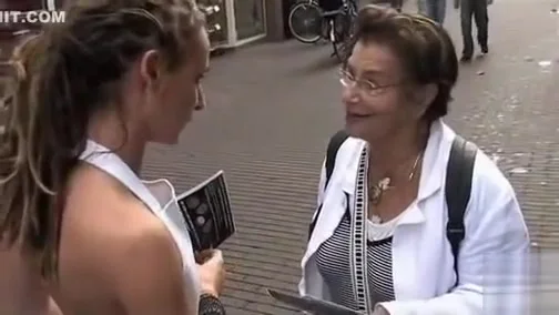 Sales promoters have visible asses while interviewing strangers
