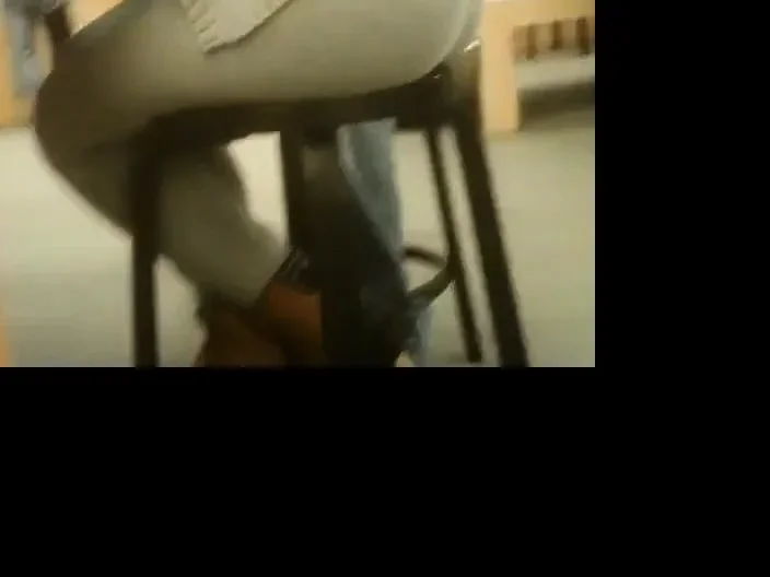 women sitting down in a store